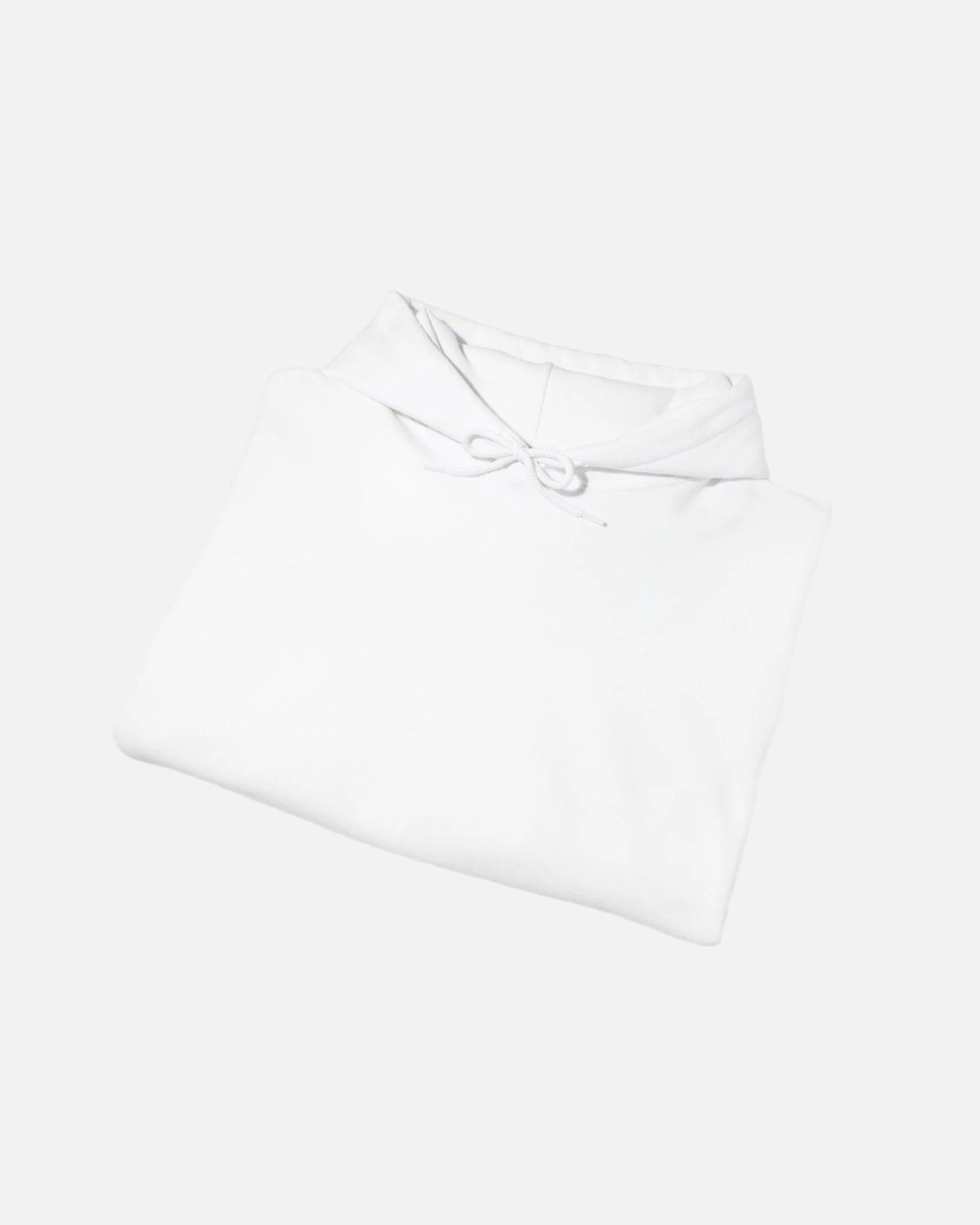 Folded view of Eggshell White Saint-Tropez Hoodie featuring elegant script logo print from Vandox SS25 Collection. Starboy old money hoodie sweatshirt clothes vandox sacrevandox vandox clothes vandox clothing