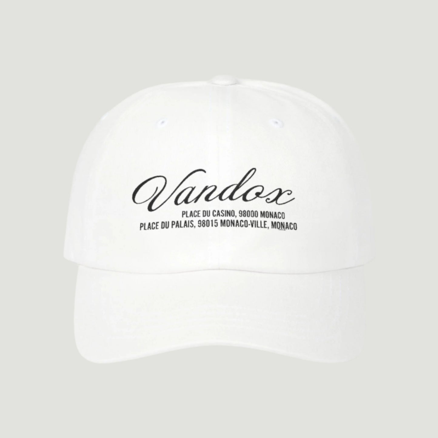 White Vandox cap featuring black embroidered script and Monaco location coordinates from the SS25 collection. Hat Cap Baseball Cap Baseball Hat starboy hat old money hats vandox sacre vandox sacrevandox vandox clothing vintage distressed baseball hat 