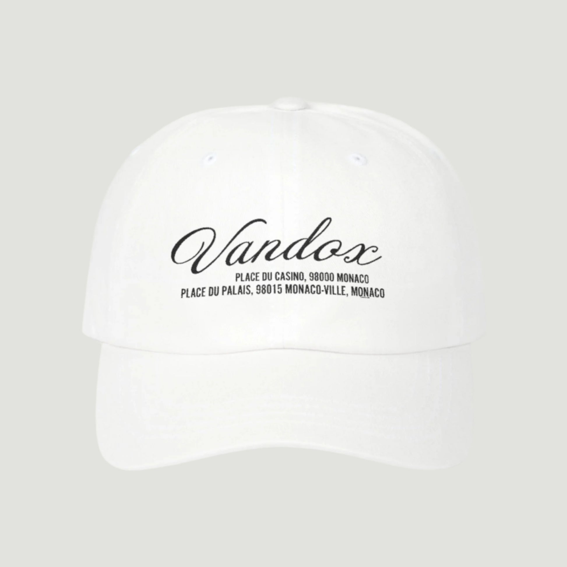 White Vandox cap featuring black embroidered script and Monaco location coordinates from the SS25 collection. Hat Cap Baseball Cap Baseball Hat starboy hat old money hats vandox sacre vandox sacrevandox vandox clothing vintage distressed baseball hat 