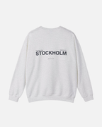 Back view of the Sport Grey Ash Vandox Stockholm Crewneck featuring bold “STOCKHOLM” and “Vandox Inc. MMXXV Golf Club” text. Starboy old money hoodie sweatshirt clothes vandox sacrevandox vandox clothes vandox clothing crewneck