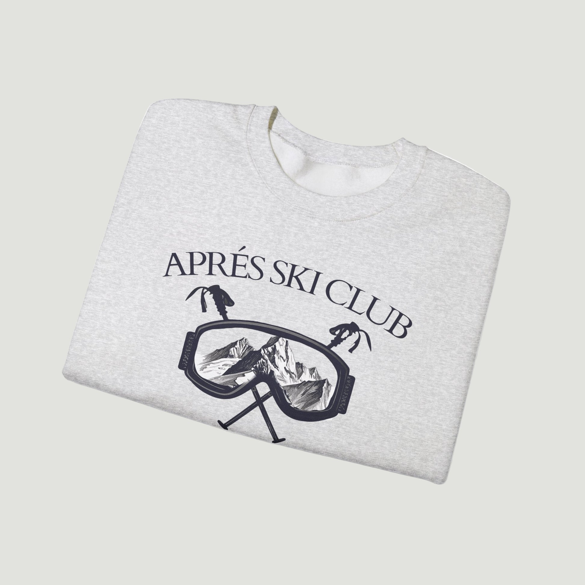 Folded sport grey ash Ski Society Crewneck by Vandox with alpine ski goggle graphic and “Après Ski Club” text on the front. Starboy old money hoodie sweatshirt clothes vandox sacrevandox vandox clothes vandox clothing