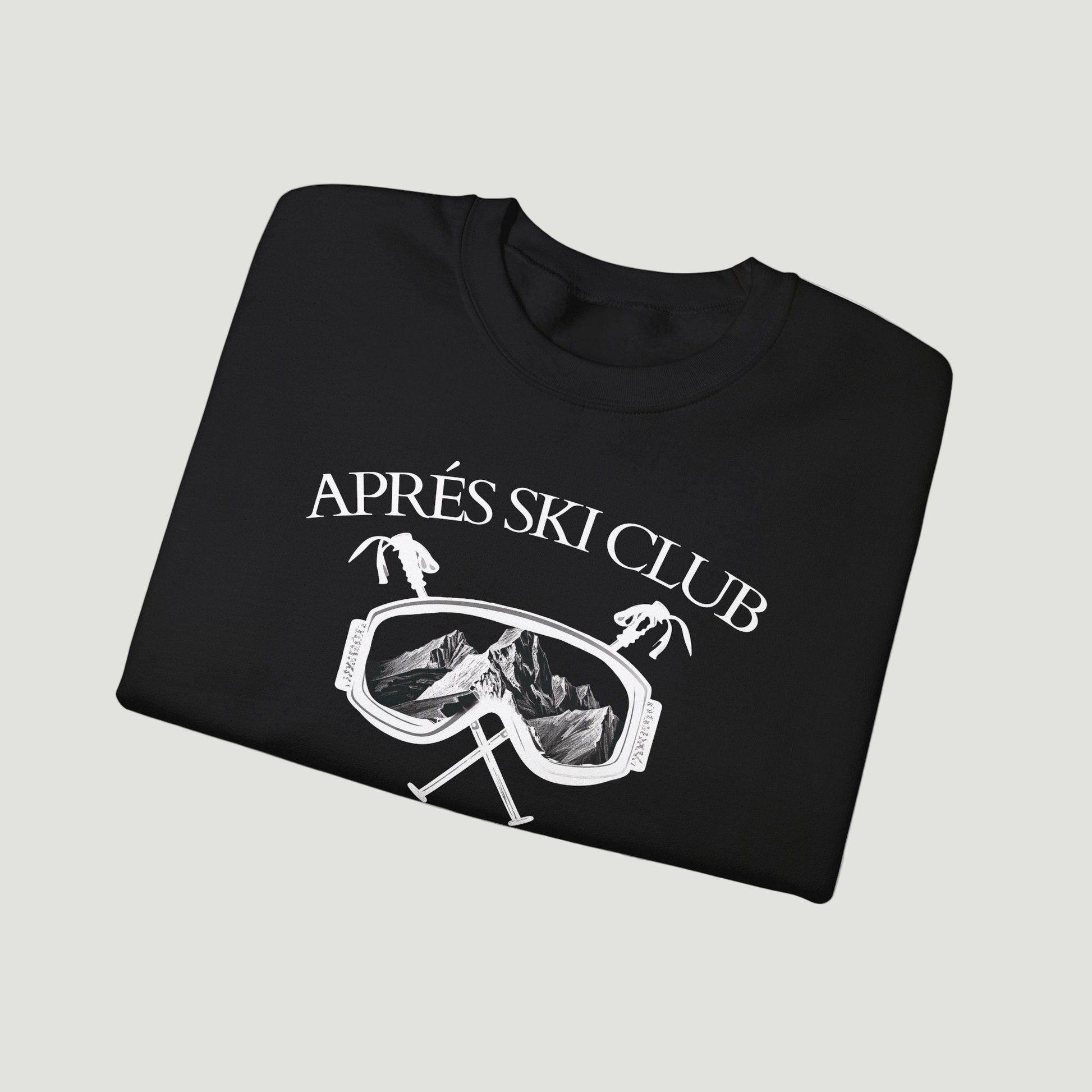 Folded deep black Ski Society Crewneck by Vandox with alpine ski goggle graphic and “Après Ski Club” text on the front. Starboy old money hoodie sweatshirt clothes vandox sacrevandox vandox clothes vandox clothing
