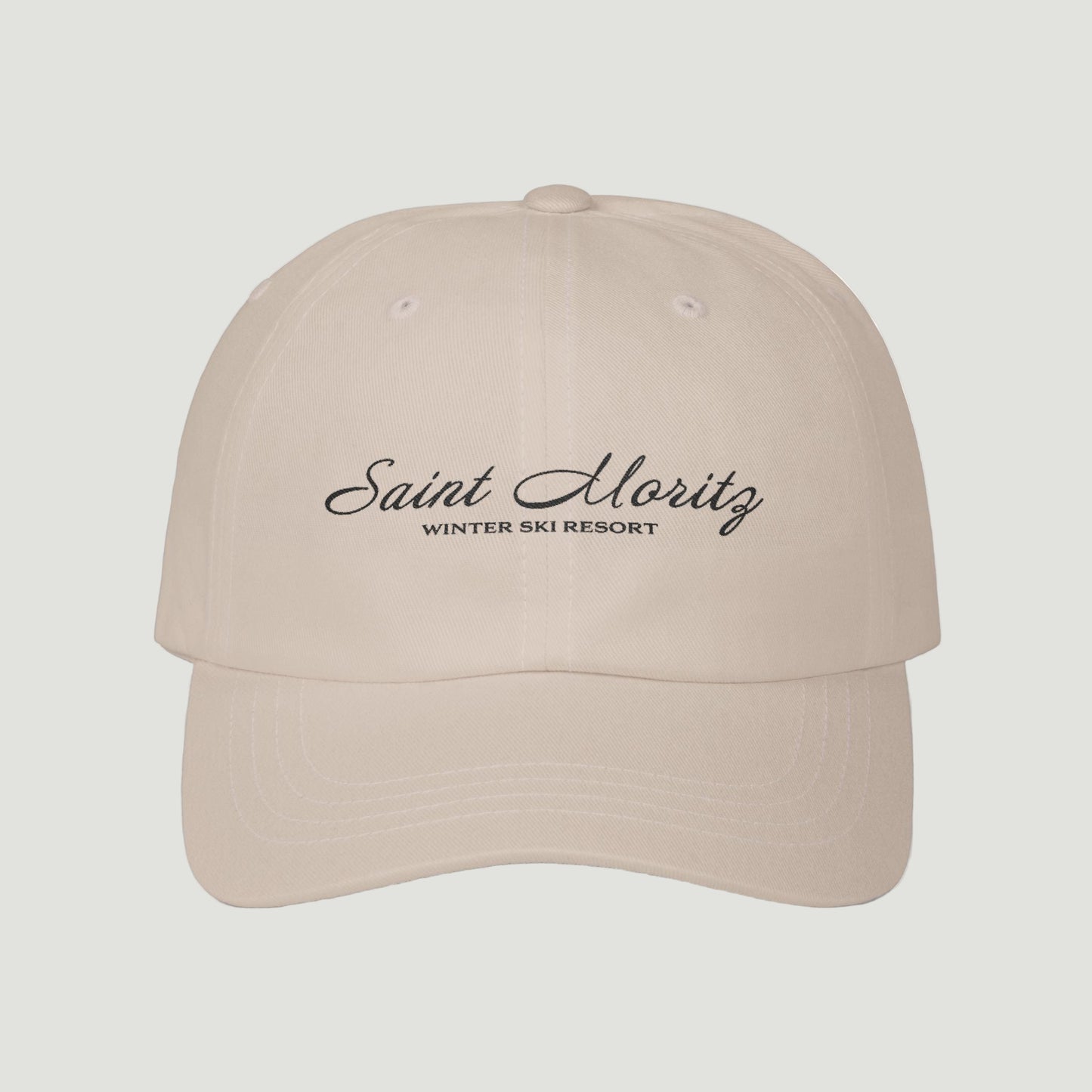 Front view of the cream sand beige stone Vandox Alpine Summit Cap featuring embroidered "Saint Moritz Winter Ski Resort" text in elegant script. Hat Cap Baseball Cap Baseball Hat starboy hat old money hats vandox sacre vandox sacrevandox vandox clothing