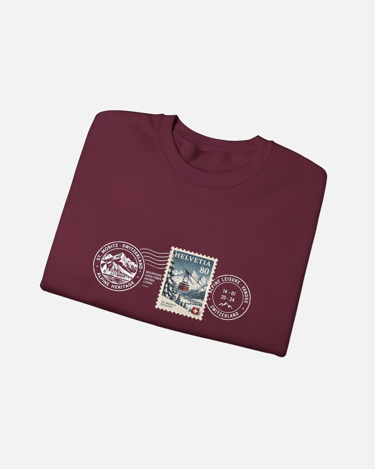 Folded view of Maroon Vandox Post Stamp crewneck sweatshirt with vintage Helvetia 80 postal stamp St. Moritz Engadin scene and Alpine Heritage Alpine Leisure Vandox postmark chest graphic. Starboy old money hoodie sweatshirt clothes vandox sacrevandox vandox clothes vandox clothing crewneck autumn clothes no hood fall clothes 