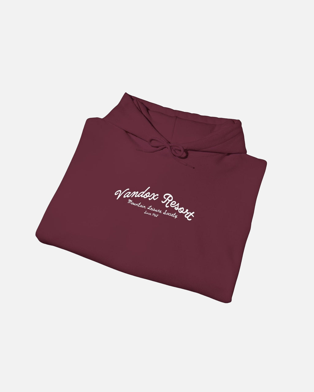 Folded view of Maroon red dark red Vandox Resort hoodie with Vandox Resort Mountain Leisure Society script chest graphic. Starboy old money hoodie sweatshirt clothes vandox sacrevandox vandox clothes vandox clothing