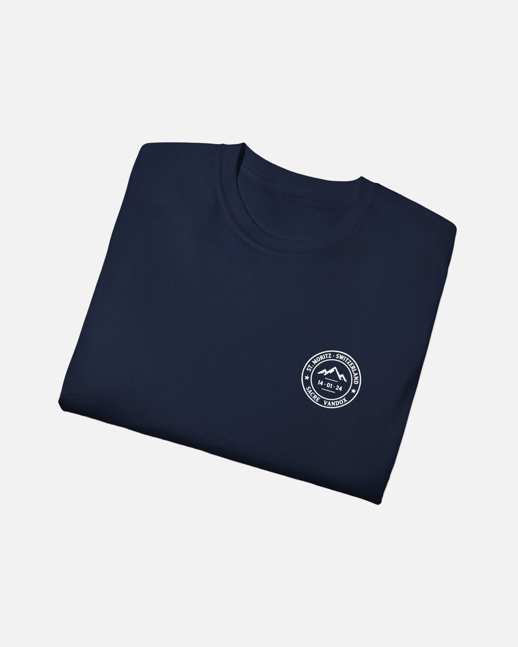 Navy Dark Blue Vandox Powder Day t-shirt folded front view with red St. Moritz Switzerland circular stamp and Sacre Vandox chest graphic. Starboy old money shirt tshirt clothes vandox sacrevandox vandox clothes vandox clothing