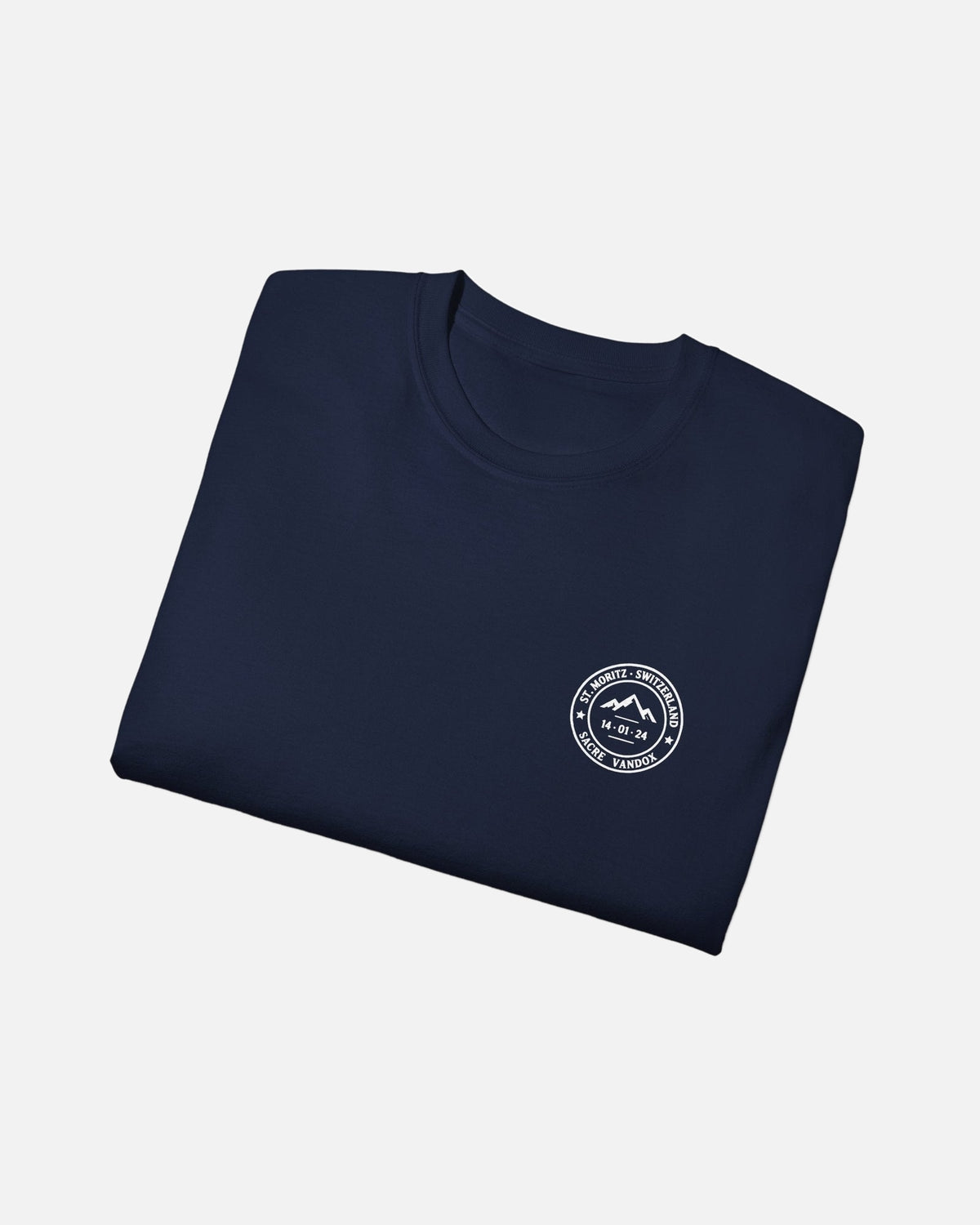 Navy Dark Blue Vandox Powder Day t-shirt folded front view with red St. Moritz Switzerland circular stamp and Sacre Vandox chest graphic. Starboy old money shirt tshirt clothes vandox sacrevandox vandox clothes vandox clothing