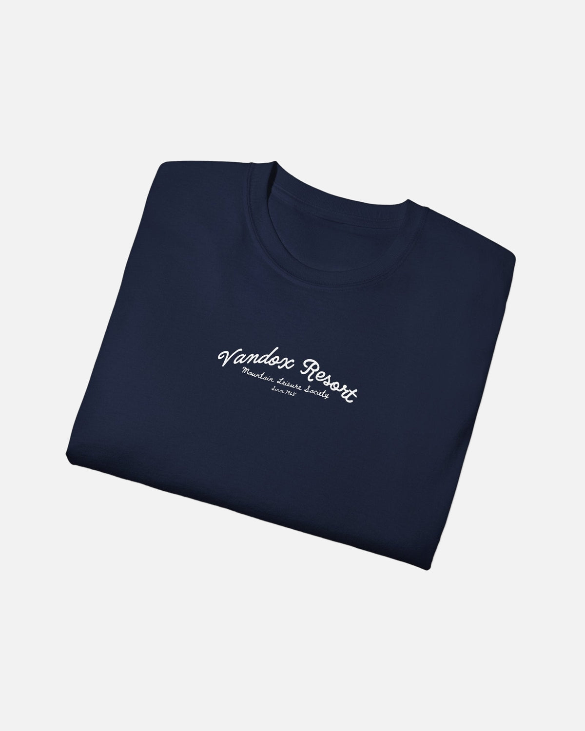 folded view of navy dark blue deep blue Vandox Resort t-shirt with Vandox Resort Mountain Leisure Society script chest graphic. Starboy old money shirt tshirt clothes vandox sacrevandox vandox clothes vandox clothing