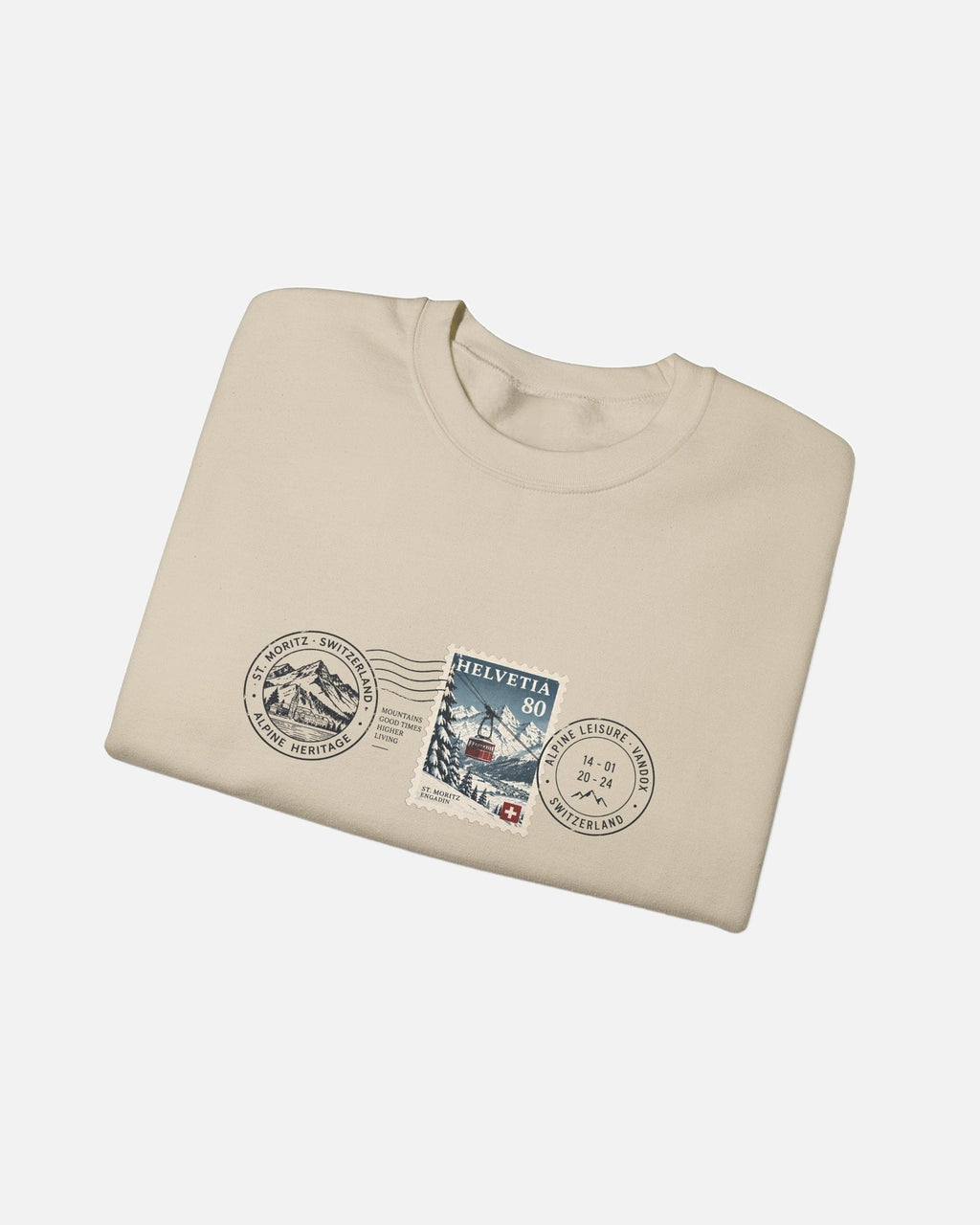 Folded view of Sand Beige Cream Vandox Post Stamp crewneck sweatshirt with vintage Helvetia 80 postal stamp St. Moritz Engadin scene and Alpine Heritage Alpine Leisure Vandox postmark chest graphic. Starboy old money hoodie sweatshirt clothes vandox sacrevandox vandox clothes vandox clothing crewneck autumn clothes no hood fall clothes 