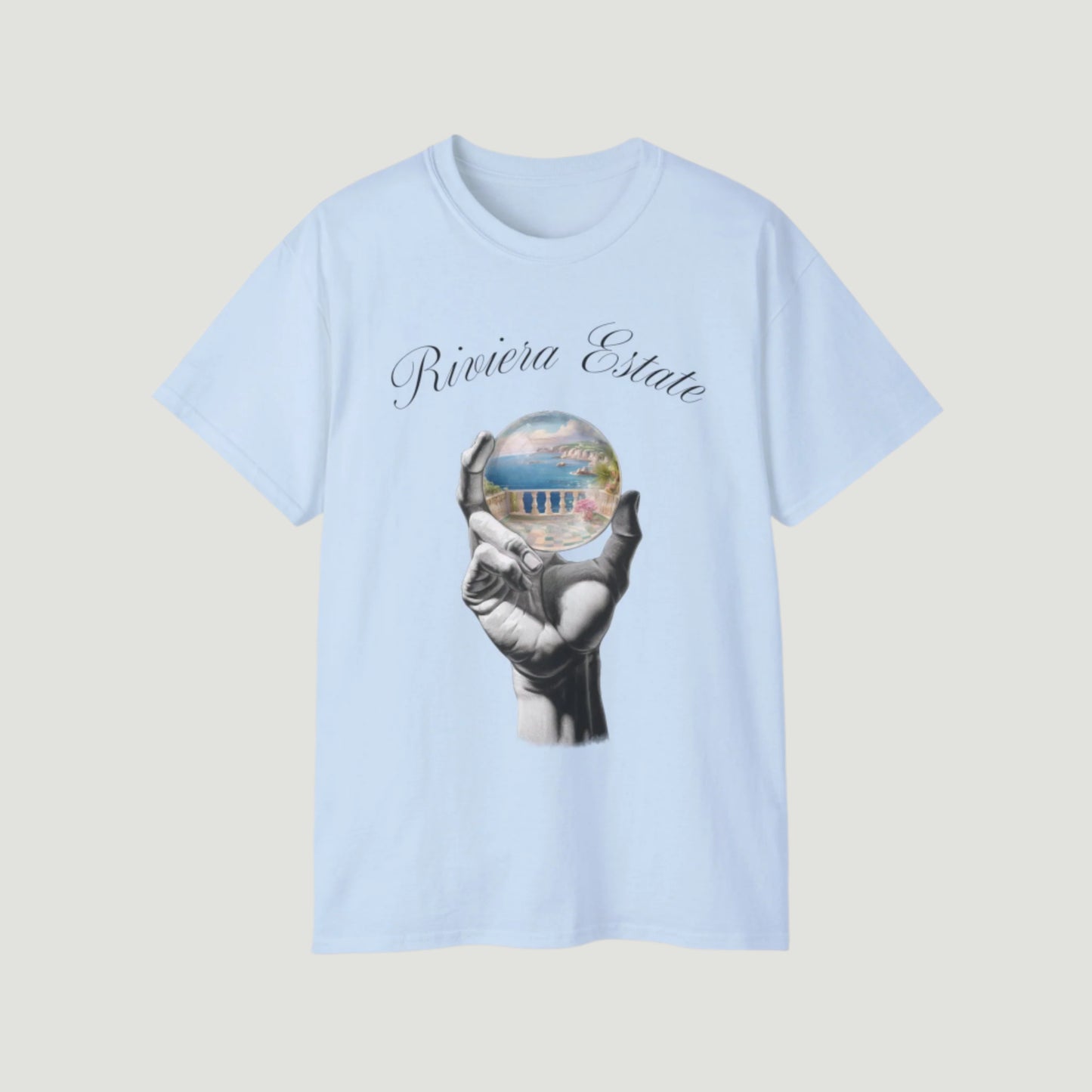 Light Blue Vandox Azure Prophecy Tee with graphic of a hand holding a crystal sphere showing a Riviera estate and “Riviera Estate” script. Starboy old money shirt tshirt clothes vandox sacrevandox vandox clothes vandox clothing