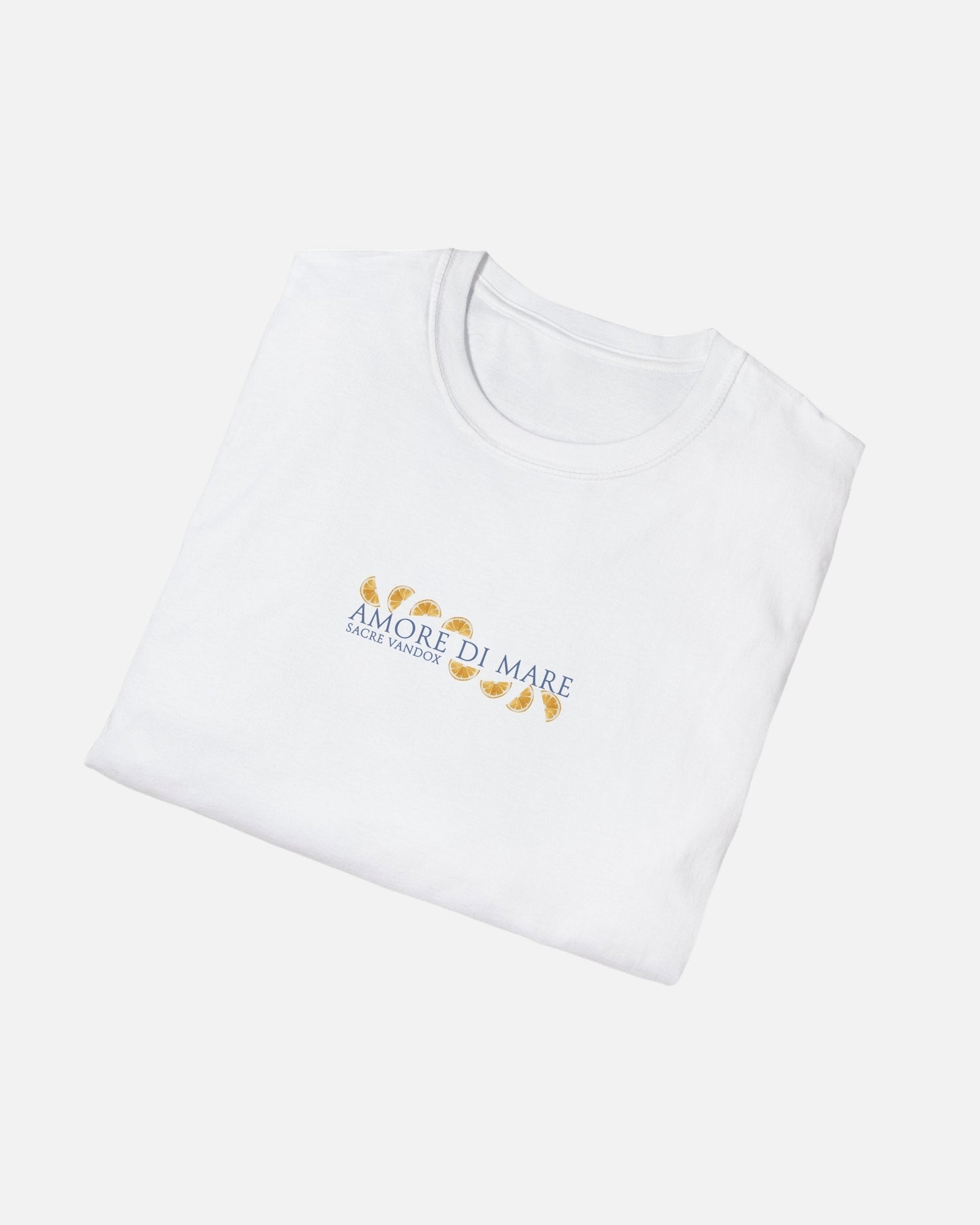 Vandox Catch of the Day Tee folded view – minimalist white premium cotton t-shirt with Amore di Mare Sacre Vandox chest print and lemon slice detail, Frutta d'Estate collection. Starboy old money shirt tshirt clothes vandox sacrevandox vandox clothes vandox clothing