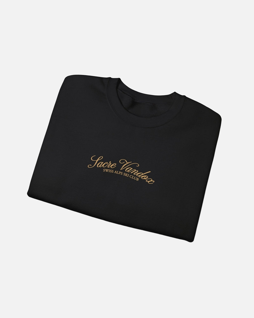 Folded view of Black Vandox Chalet Edit crewneck sweatshirt with gold Sacre Vandox Swiss Alps Ski Club script chest graphic. Starboy old money hoodie sweatshirt clothes vandox sacrevandox vandox clothes vandox clothing crewneck autumn clothes no hood fall clothes 