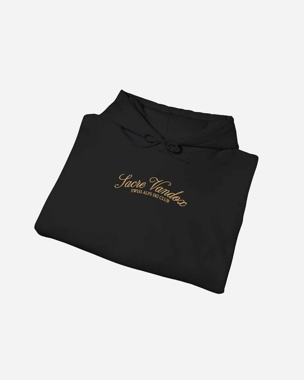 Folded View of Black Vandox Chalet Edit hoodie with gold Sacre Vandox Swiss Alps Ski Club script chest graphic. Starboy old money hoodie sweatshirt clothes vandox sacrevandox vandox clothes vandox clothing