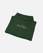Folded View of Forest Green Vandox Chalet Edit hoodie with gold Sacre Vandox Swiss Alps Ski Club script chest graphic. Starboy old money hoodie sweatshirt clothes vandox sacrevandox vandox clothes vandox clothing