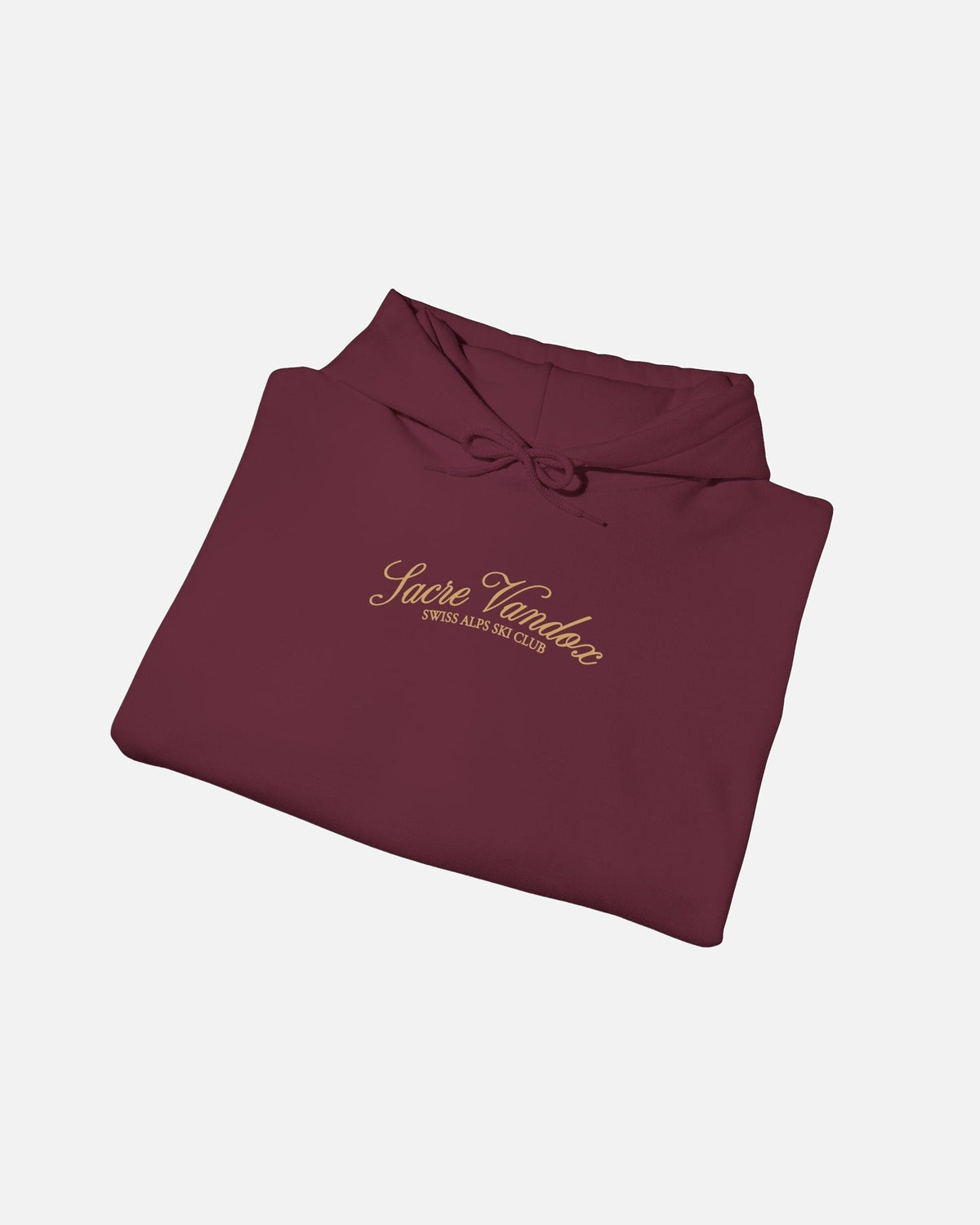 Folded View of Maroon Vandox Chalet Edit hoodie with gold Sacre Vandox Swiss Alps Ski Club script chest graphic. Starboy old money hoodie sweatshirt clothes vandox sacrevandox vandox clothes vandox clothing