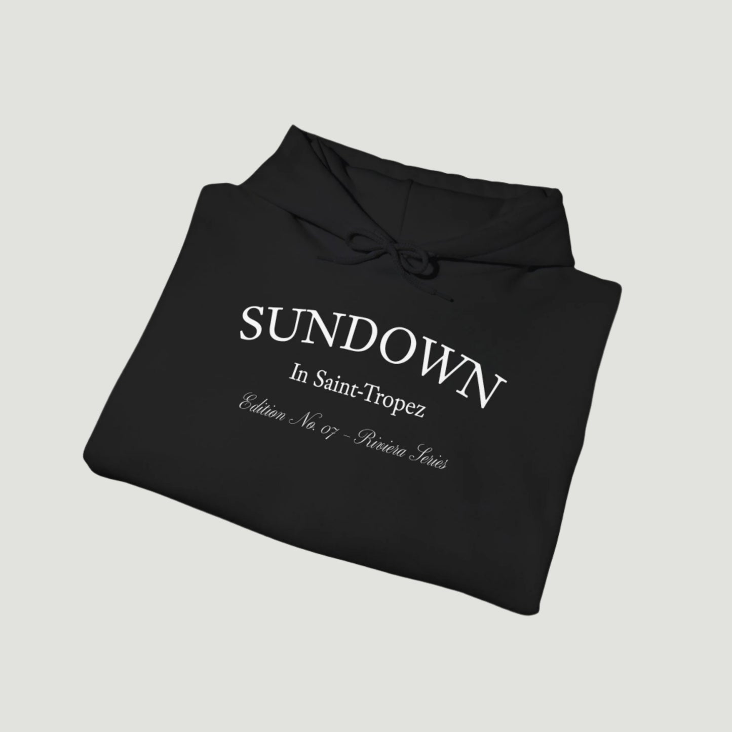 Folded view of Deep Dark Citrus Sunset Hoodie featuring Saint-Tropez citrus plate graphic and Sundown script from Vandox SS25 Collection. Starboy old money hoodie sweatshirt clothes vandox sacrevandox vandox clothes vandox clothing