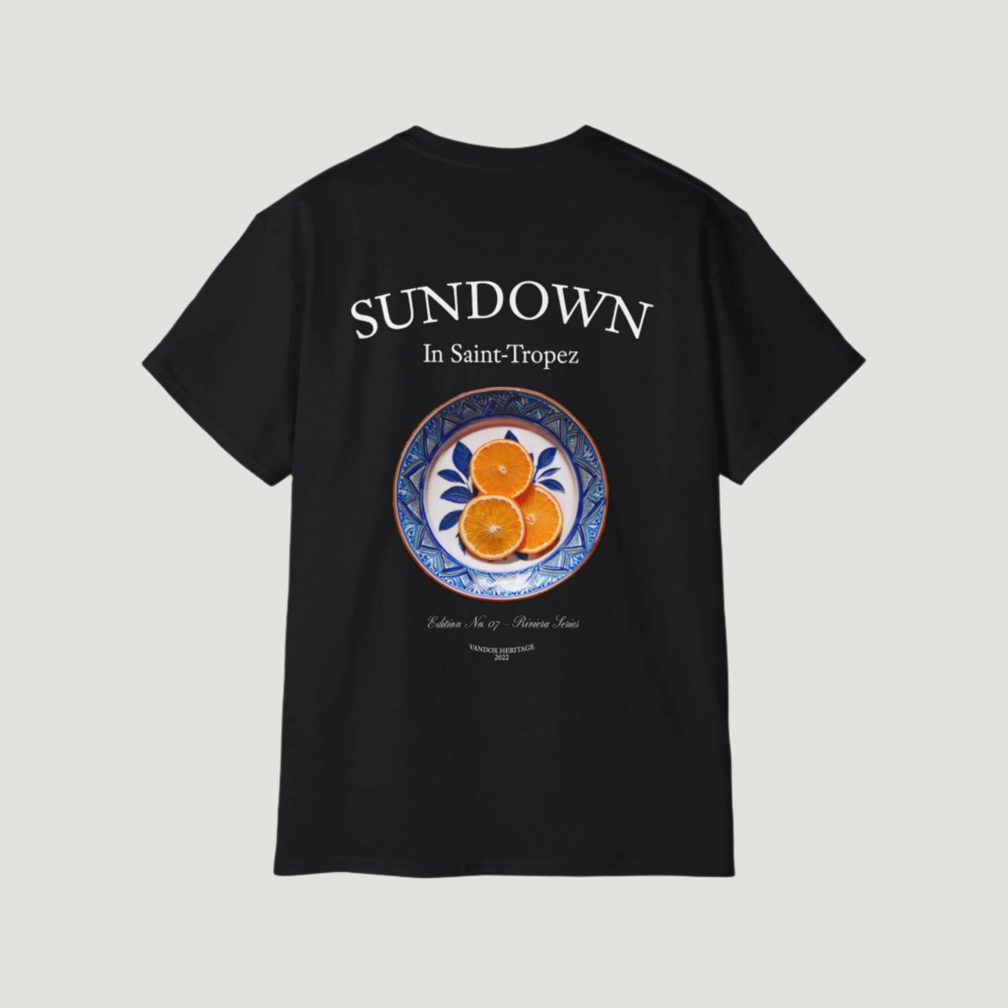 Deep Black Vandox Citrus Sunset T-Shirt with small Saint-Tropez “Sundown” chest print and large back graphic of oranges on a Mediterranean plate. Starboy old money shirt tshirt clothes vandox sacrevandox vandox clothes vandox clothing