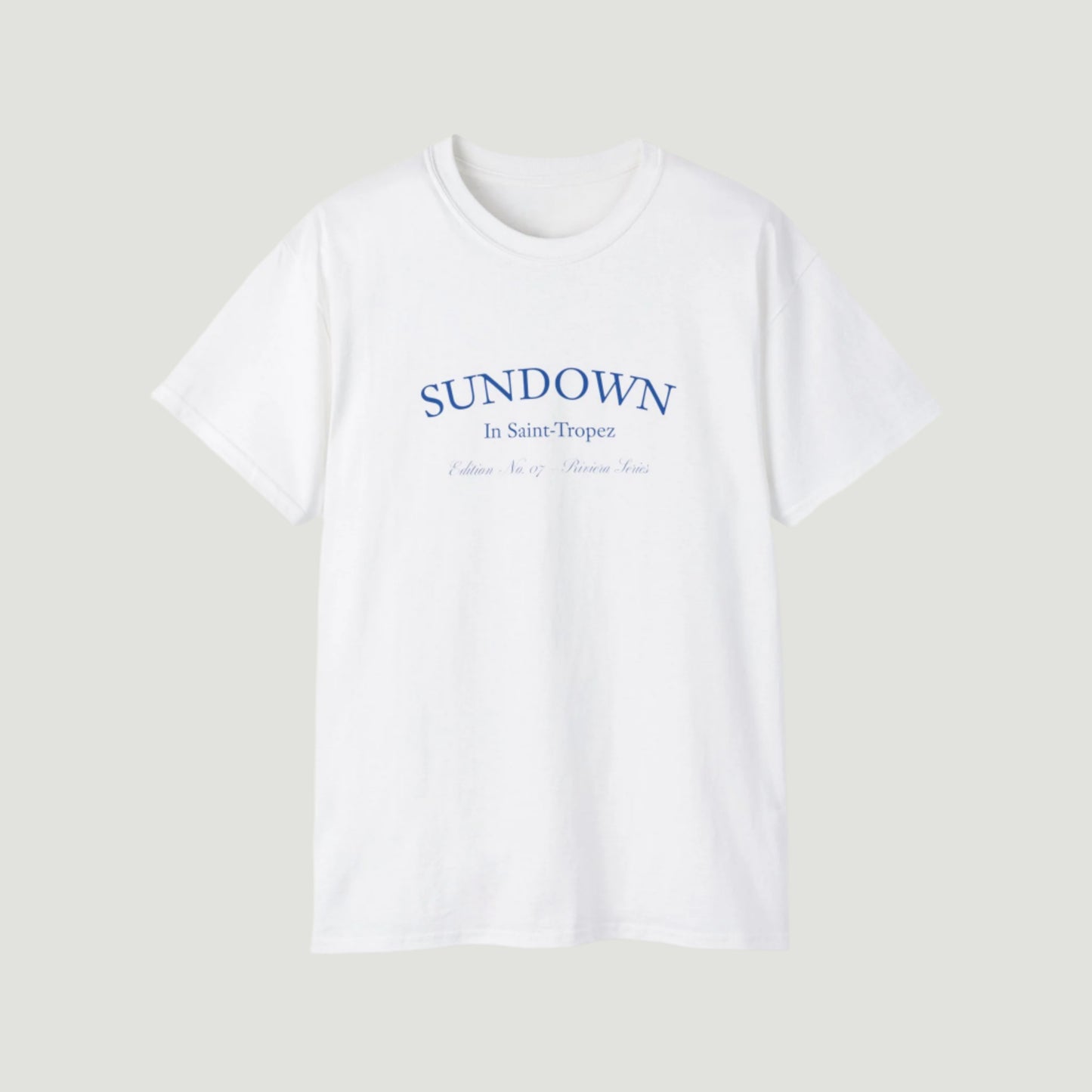 Eggshell White Vandox Citrus Sunset T-Shirt with small Saint-Tropez “Sundown” chest print and large back graphic of oranges on a Mediterranean plate. Starboy old money shirt tshirt clothes vandox sacrevandox vandox clothes vandox clothing
