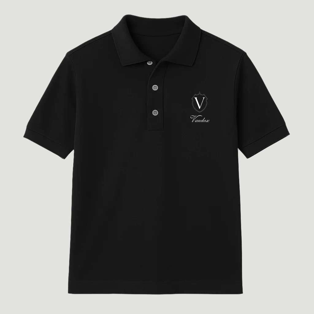Deep Black Vandox Crest Polo featuring minimalist royal crest with signature “V” emblem and script branding, blending timeless elegance and modern refinement. Starboy old money polo shirt clothes vandox sacrevandox vandox clothes vandox clothing