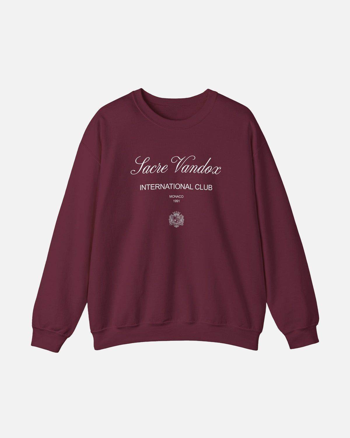 Maroon dark red Vandox Le Rocher Crewneck, front view with Sacre Vandox script, International Club Monaco 1991 text and small crest, luxury streetwear crewneck. Starboy old money crewneck sweatshirt clothes vandox sacrevandox vandox clothes vandox clothing