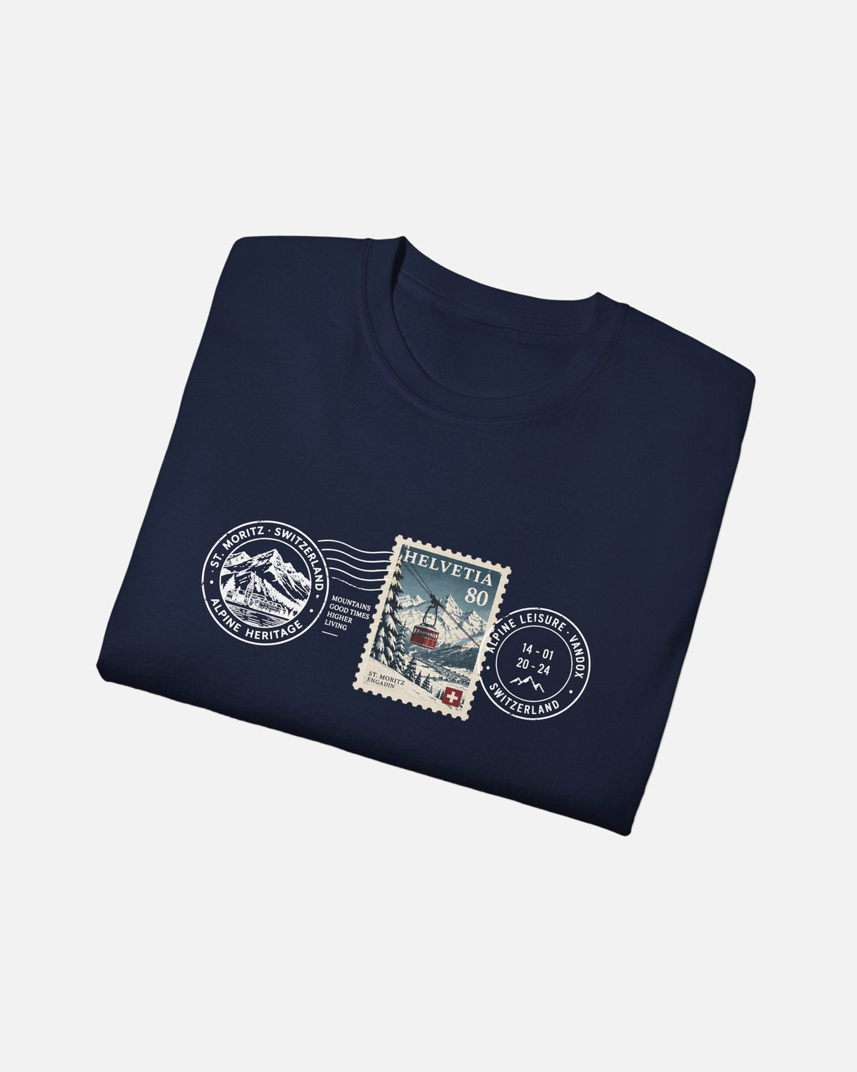 folded view of Navy Dark blue deep blue Vandox Post Stamp t-shirt with vintage Helvetia 80 postal stamp St. Moritz Engadin scene and Alpine Heritage Alpine Leisure Vandox postmark chest graphic. Starboy old money shirt tshirt clothes vandox sacrevandox vandox clothes vandox clothing