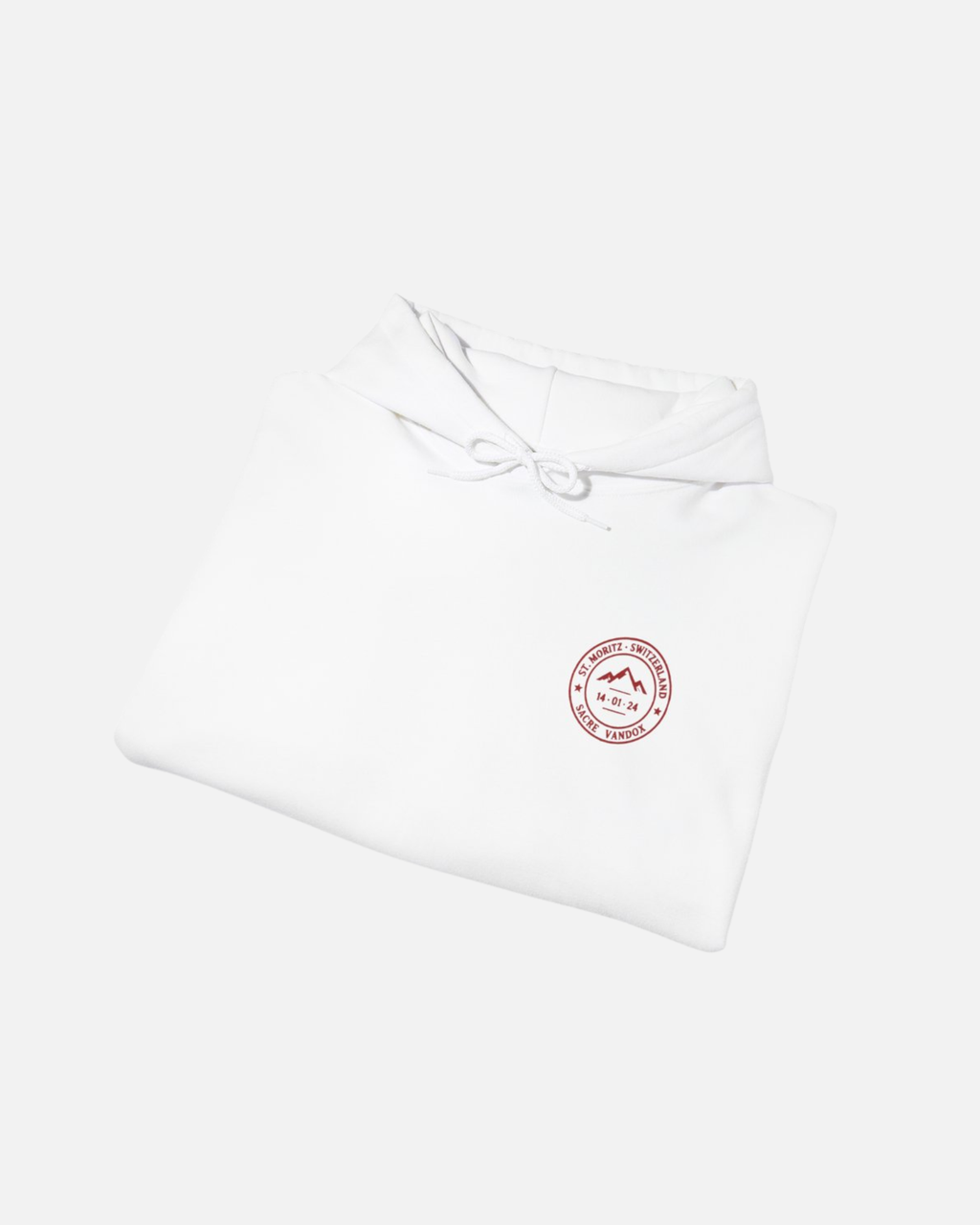 Eggshell White Vandox Powder Day hoodie front folded view with red St. Moritz Switzerland circular stamp and Sacre Vandox chest graphic. Starboy old money hoodie sweatshirt clothes vandox sacrevandox vandox clothes vandox clothing