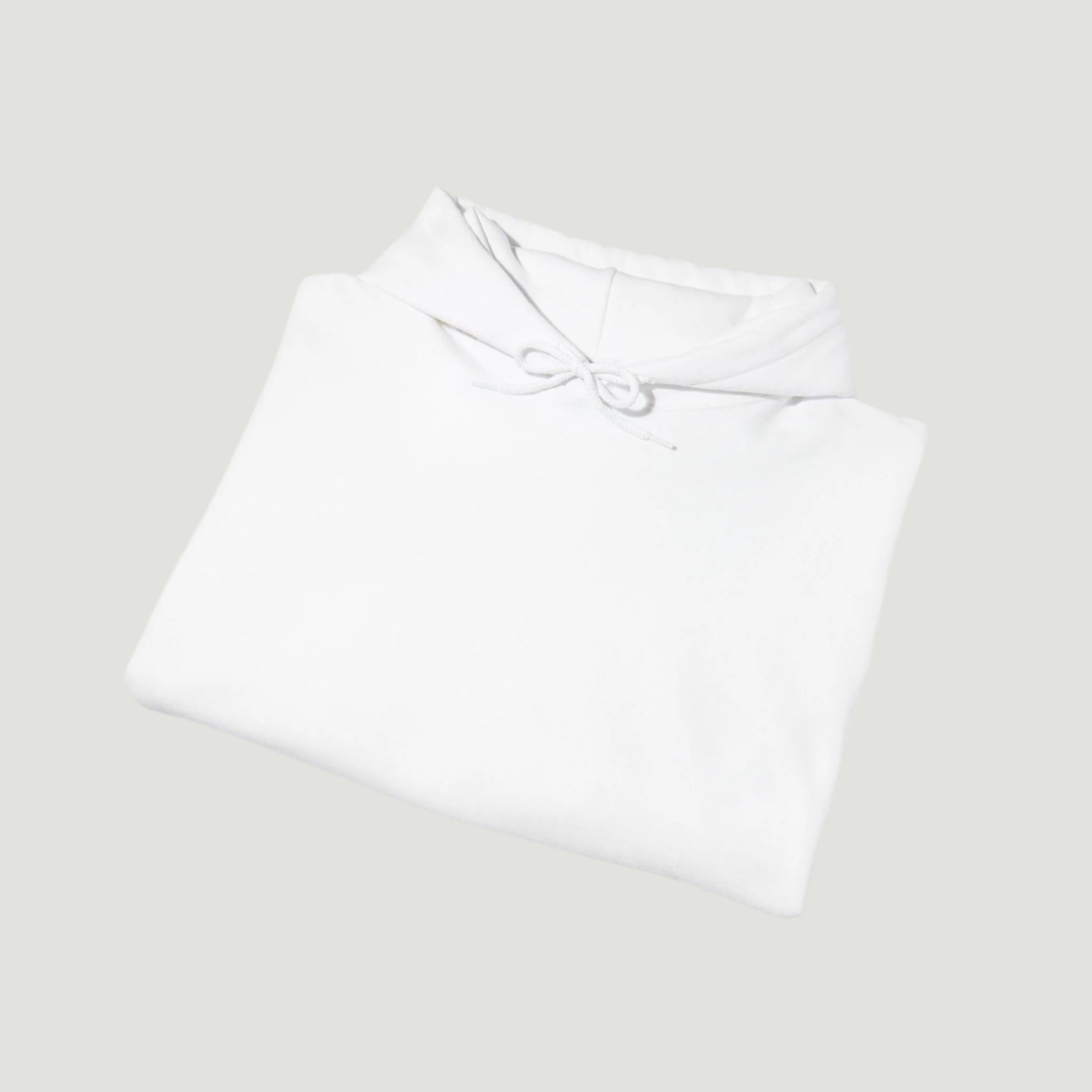 Folded view of Eggshell White Saint-Tropez Hoodie featuring elegant script logo print from Vandox SS25 Collection. Starboy old money hoodie sweatshirt clothes vandox sacrevandox vandox clothes vandox clothing