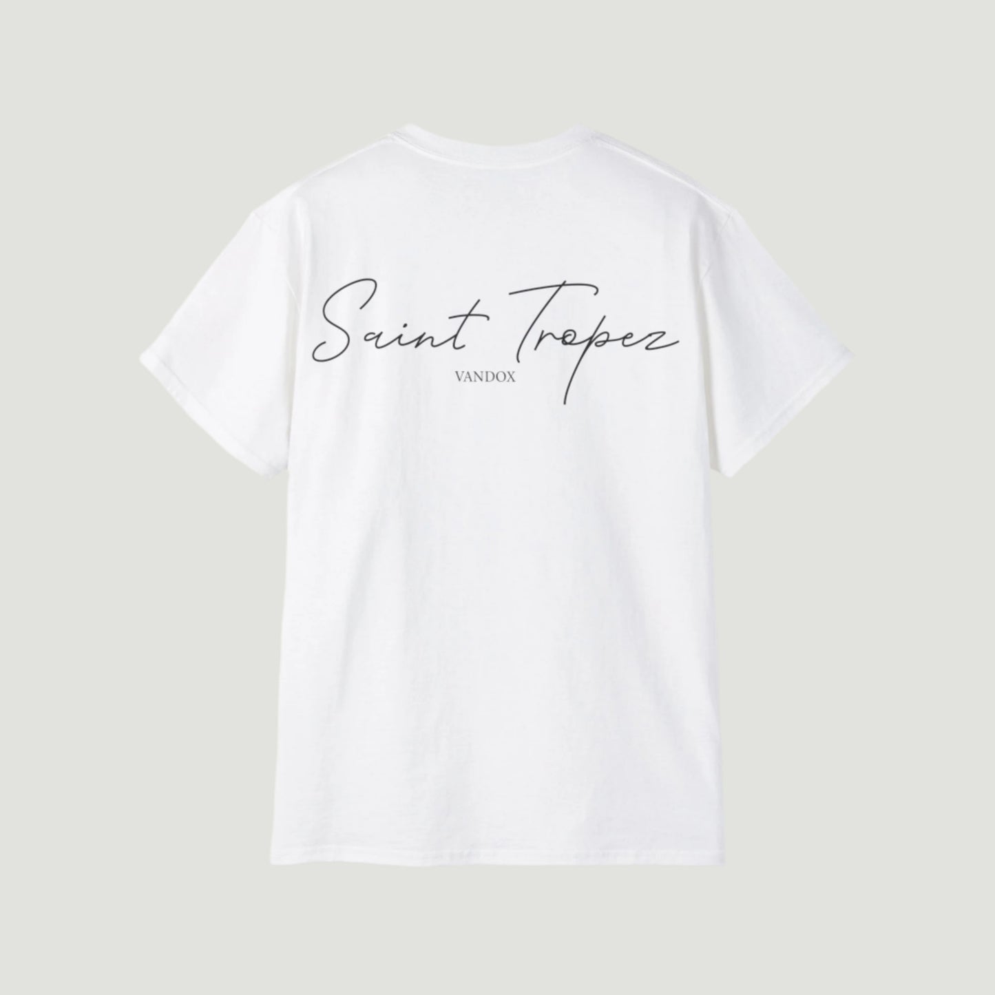 Eggshell White Vandox Saint Tropez T-Shirt with large white cursive “Saint Tropez” script on the back and small Vandox branding. Starboy old money shirt tshirt clothes vandox sacrevandox vandox clothes vandox clothing