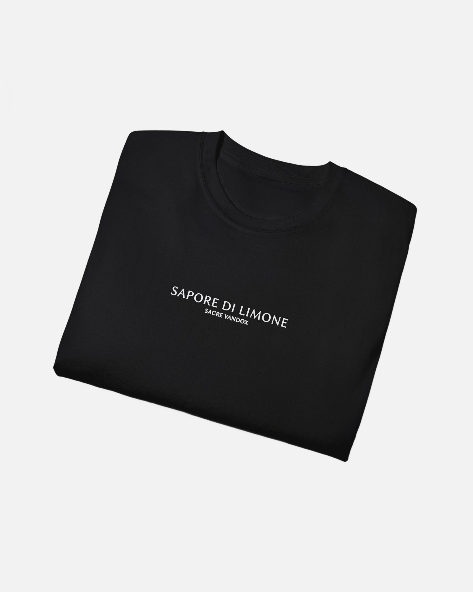 Vandox Sapore di Limone Tee folded view – minimalist black premium cotton t-shirt with Sapore di Limone Sacre Vandox lettering, Frutta d'Estate summer collection.
Starboy old money shirt tshirt clothes vandox sacrevandox vandox clothes vandox clothing