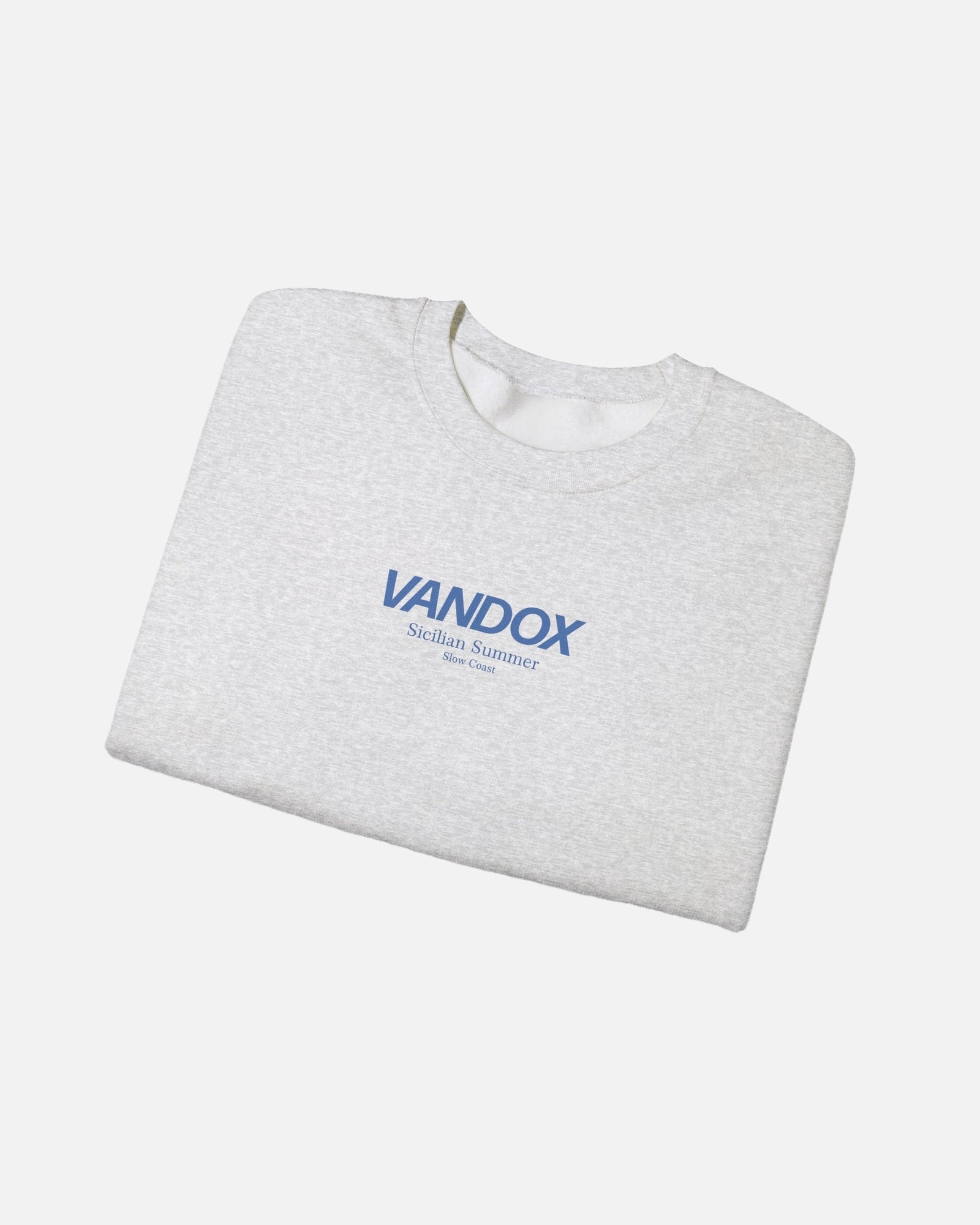 Folded View of Ash Grey crewneck sweatshirt with blue VANDOX Sicilian Summer Slow Coast front graphic. Starboy old money hoodie sweatshirt clothes vandox sacrevandox vandox clothes vandox clothing crewneck