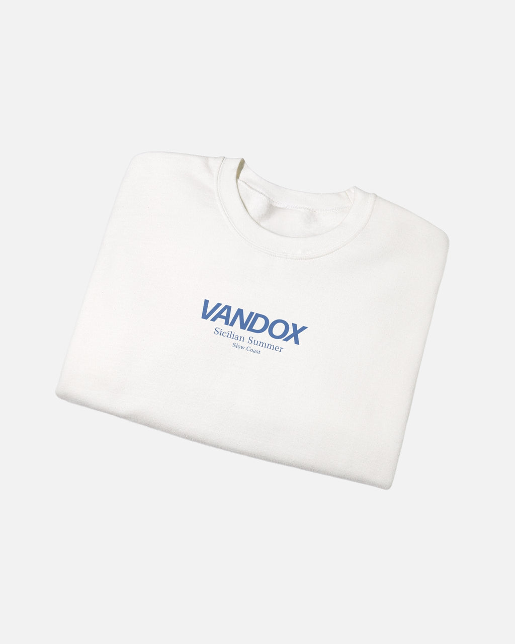 Folded View of White crewneck sweatshirt with blue VANDOX Sicilian Summer Slow Coast front graphic. Starboy old money hoodie sweatshirt clothes vandox sacrevandox vandox clothes vandox clothing crewneck