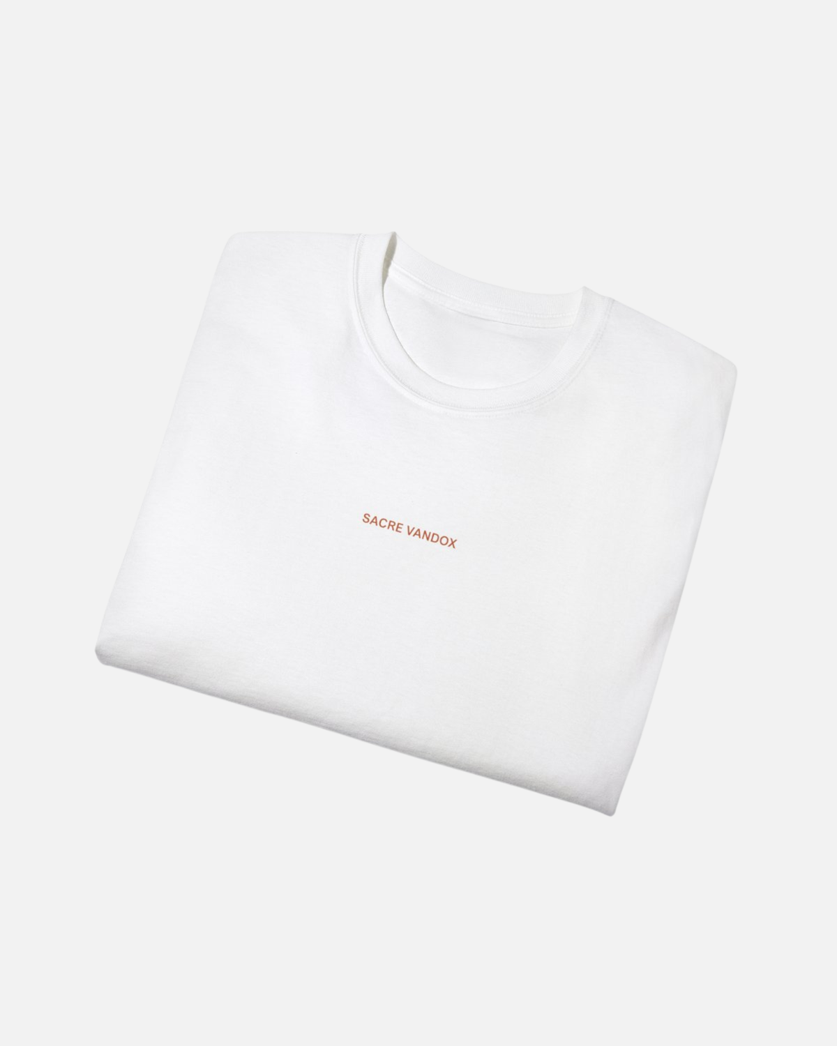Folded view of Vandox Ski Club Poster White t-shirt with Sacre Vandox red wordmark chest graphic. Starboy old money shirt tshirt clothes vandox sacrevandox vandox clothes vandox clothing