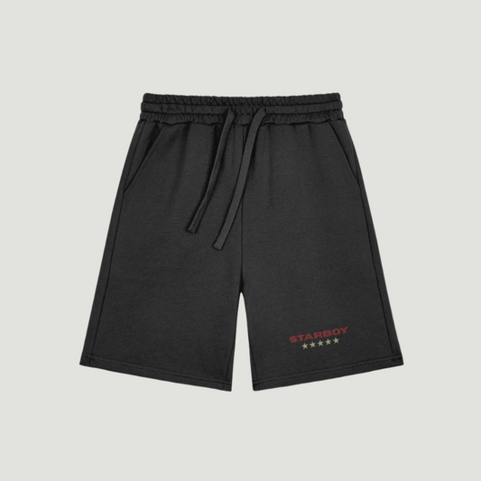 Deep Black Vandox shorts with red “STARBOY” text and five-star emblem near hem, featuring drawstring waist and side pockets. Starboy old money shorts pants bottoms clothes vandox sacrevandox vandox clothes vandox clothing