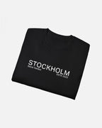 Folded view of Black Vandox Stockholm t-shirt with distressed STOCKHOLM Sacre Vandox ESTD 2022 front graphic print. Starboy old money shirt tshirt clothes vandox sacrevandox vandox clothes vandox clothing