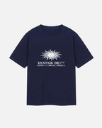 Front view of navy Vandox Sun Dept oversized cotton t-shirt with white distressed sun symbol and VANDOX DEPT MYKONOS 846 00 GREECE front graphic print. Old money summer aesthetic, quiet luxury european streetwear, mediterranean riviera style, mykonos beach club vibe. Starboy old money cotton shirt tshirt clothes vandox dept vandox sun dept vandox summer vandox clothes vandox clothing. Navy 