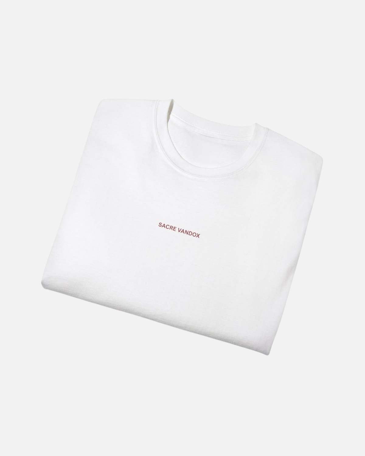 Folded view of White Vandox Red Skis Poster t-shirt with Sacre Vandox red wordmark chest graphic. Starboy old money shirt tshirt clothes vandox sacrevandox vandox clothes vandox clothing