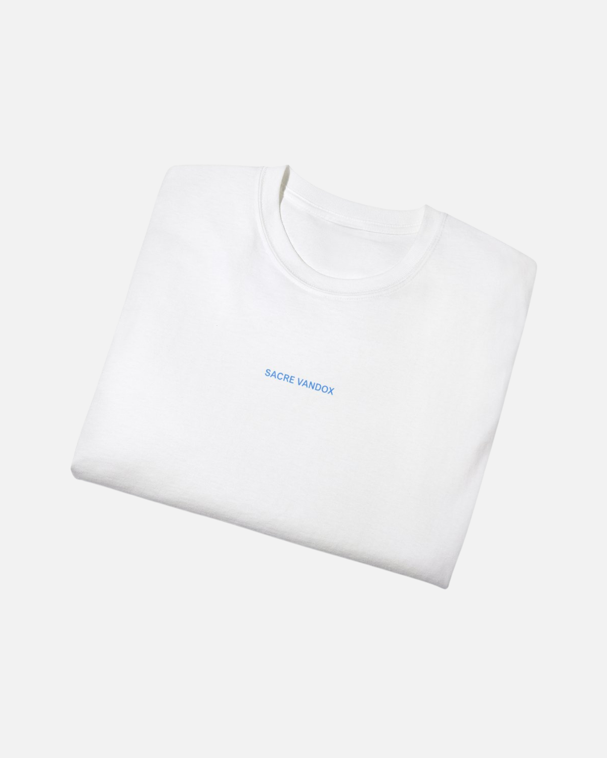 Folded view of White Vandox Swiss Alps Poster t-shirt with Sacre Vandox blue wordmark chest graphic. Starboy old money shirt tshirt clothes vandox sacrevandox vandox clothes vandox clothing