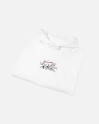 foldeed view of White eggshell white offwhite Vandox Apres Ski hoodie front view with Winners Club Sacre Vandox mountain range chest graphic. Starboy old money hoodie sweatshirt clothes vandox sacrevandox vandox clothes vandox clothing