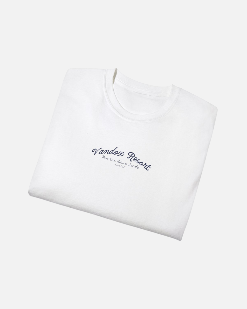 folded view of white egshell white offwhite Vandox Resort t-shirt with Vandox Resort Mountain Leisure Society script chest graphic. Starboy old money shirt tshirt clothes vandox sacrevandox vandox clothes vandox clothing